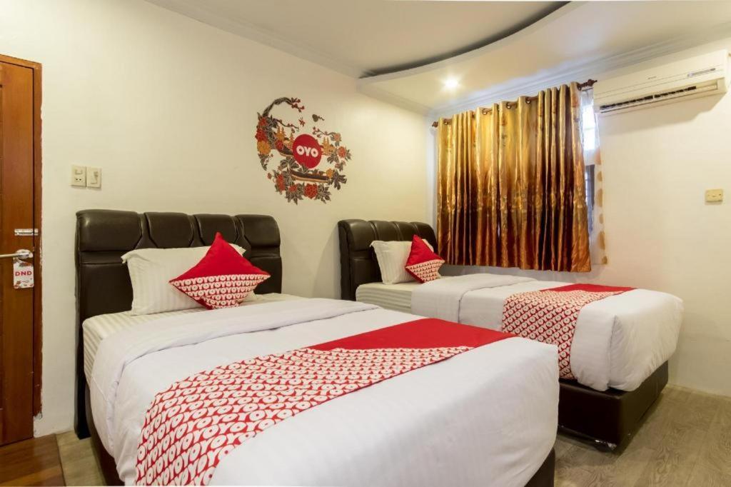 Oyo 619 Naufal Guest House Syariah メダン エクステリア 写真